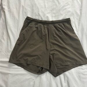 Men’s olive green Lululemon surge shorts (size large, 5 inch inseam)
